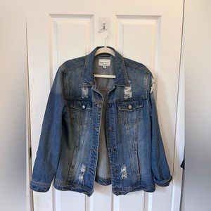 Blue ripped denim jacket